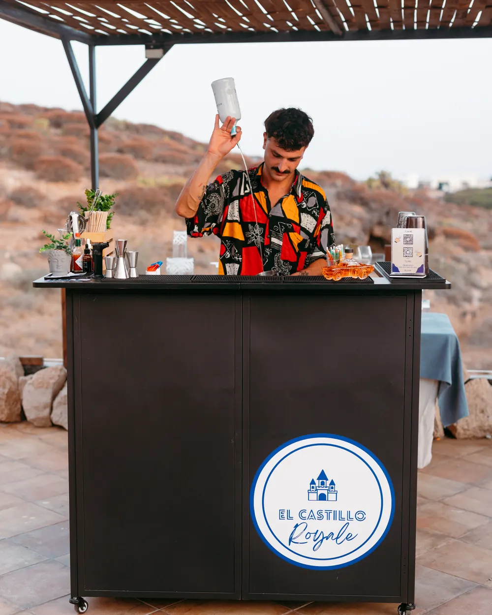 Simone behind the El Castillo Royale mobile bar in Tenerife